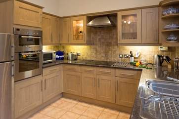 There is plenty of space in the kitchen.