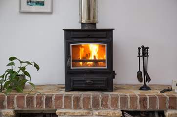 The cosy wood-burner, perfect for a snug night in.