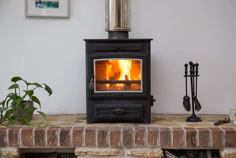 The cosy wood-burner, perfect for a snug night in.