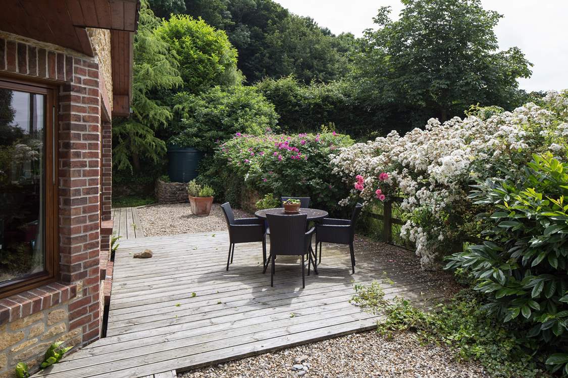 The large sheltered terrace at the rear of Barbridge Cottage.