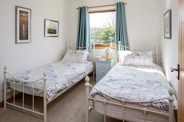 The twin-room is bright and cheerful.