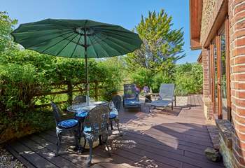 The lovely sunny terrace has unspoilt countryside views, perfect for al fresco dining.