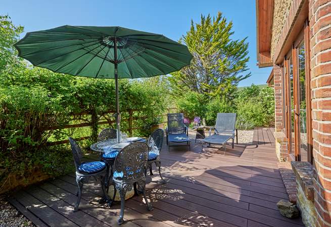 The lovely sunny terrace has unspoilt countryside views, perfect for al fresco dining.