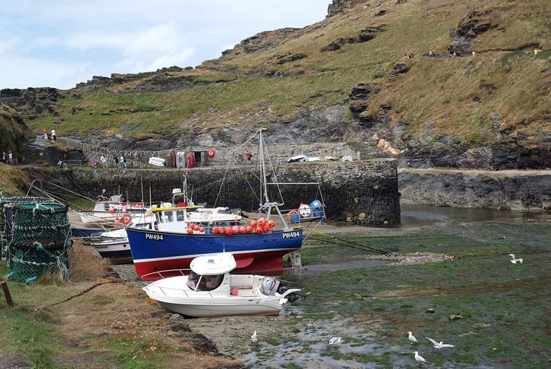 The harbour wall providing shelter before local boats leave the harbour around the dog leg bend and out to the open sea.