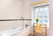 The bathroom on the first floor.