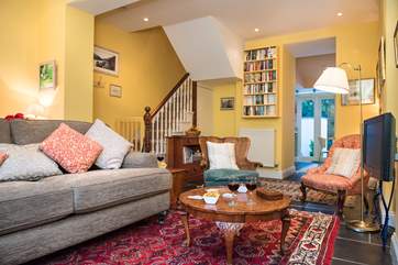 The stairs lead up from the sitting-room to the bedrooms and bathrooms.