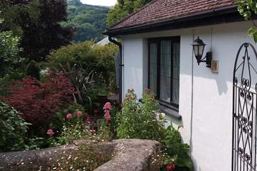 This is the path to the cottage from the road where you can drop off your luggage. Parking is just 100 yards away in the village centre - there is a dedicated space for you.
