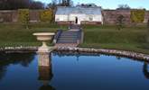 Inland, visit the National Trust estate at Arlington, lovely gardens, historic house, carriage museum and tea shop. - Thumbnail Image