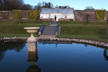 Inland, visit the National Trust estate at Arlington, lovely gardens, historic house, carriage museum and tea shop.