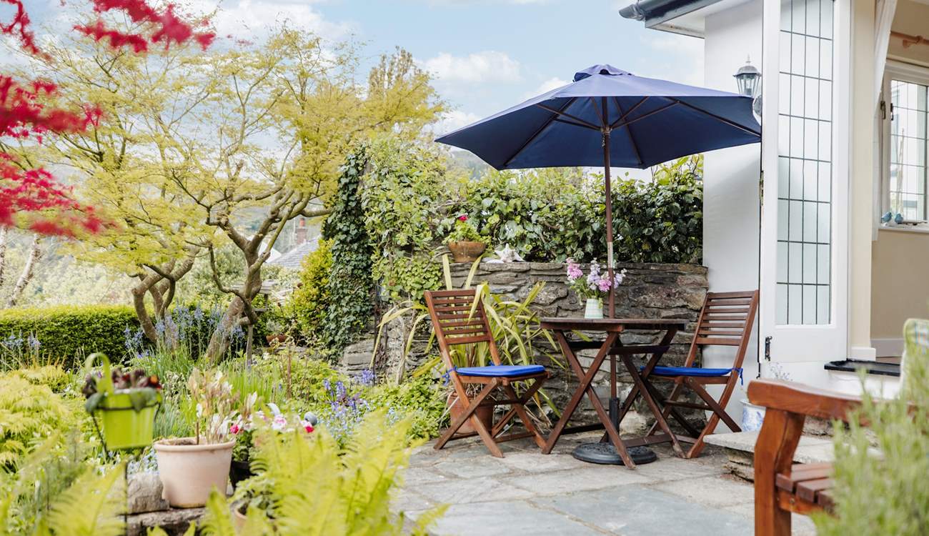 Welcome to Little Bessemer. Sit on the terrace outside the cottage and take in all the wonderful detail in this special garden.