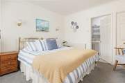 The bedroom can be made up as a super king or twin, and has an en suite shower-room.