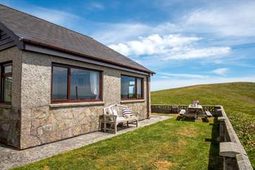 A sea view in one direction and the countryside in the other
