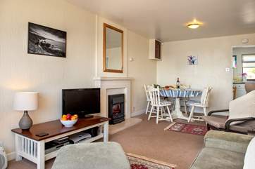 If you don't want to eat in the kitchen or in the garden, you also have the option to eat in the sitting-room - so many choices.