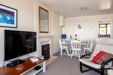 If you don't want to eat in the kitchen or in the garden, you also have the option to eat in the sitting-room - so many choices.