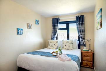 A kingsize bed awaits in bedroom 2 as well