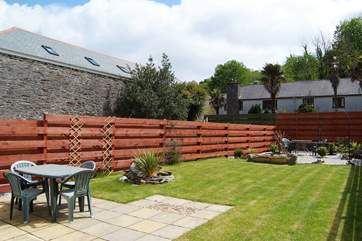 The large, landscaped garden.
