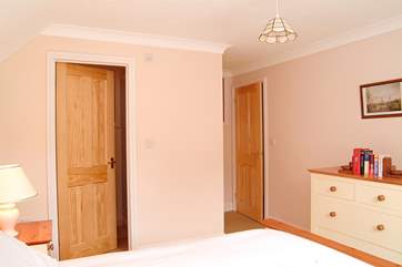 The master bedroom has an en suite shower-room.