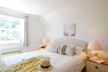 Bedroom 1 has a double bed and en suite shower room.