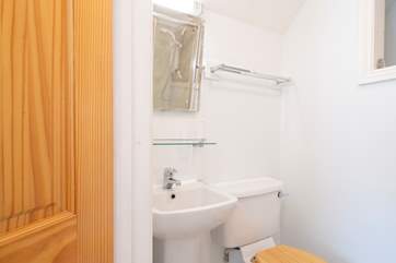 The master bedroom has an en suite shower room.