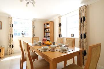 The nicely furnished dining-area.