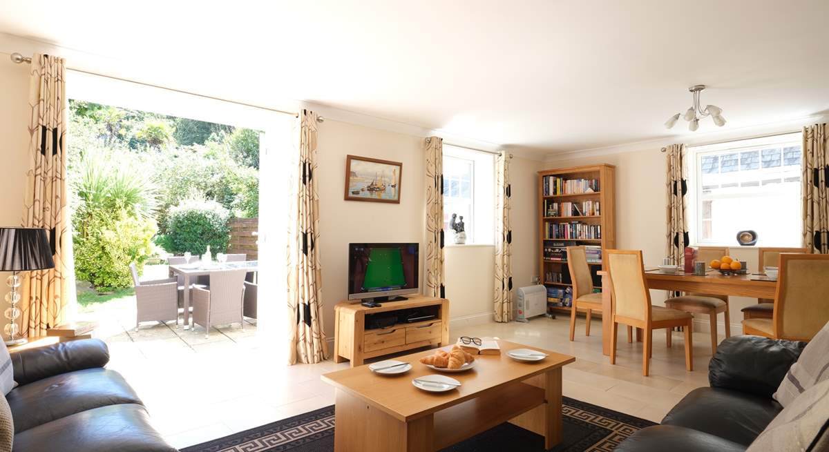 The sitting-area looks out over the large, landscaped garden.