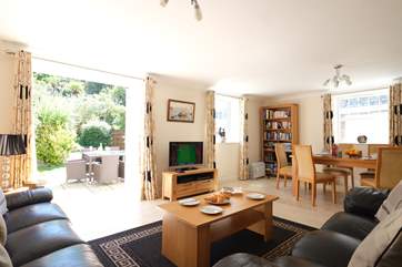 The sitting-area looks out over the large, landscaped garden.