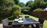 A lovely large garden, perfect for al fresco dining. - Thumbnail Image