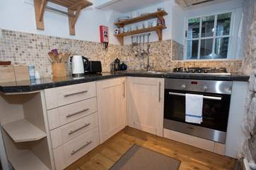 The compact but well equipped kitchen.