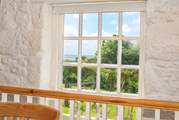 The large picture window with unobscured far reaching countryside views - and on a clear day you can see the sea!
