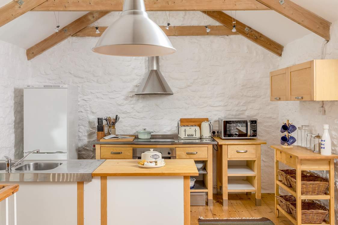 The lovely kitchen has everything you need.