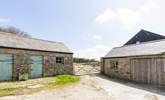 The entrance to the cottage parking with the laundry-room for Little Trebarvah in the single-storey barn on the left, the owners share access at the bottom of this drive.  - Thumbnail Image