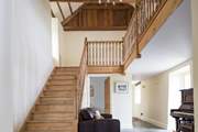 Head upstairs to discover the rest of the bedrooms.
