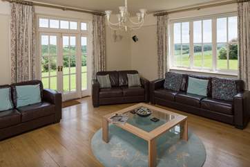 The stting-room has windows taking in the amazing country views.