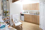 The annexe has a kitchenette and en suite facilities.