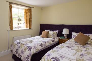 Bedroom 1 can be either a twin or double, or a snug with a TV - seen here as a twin.