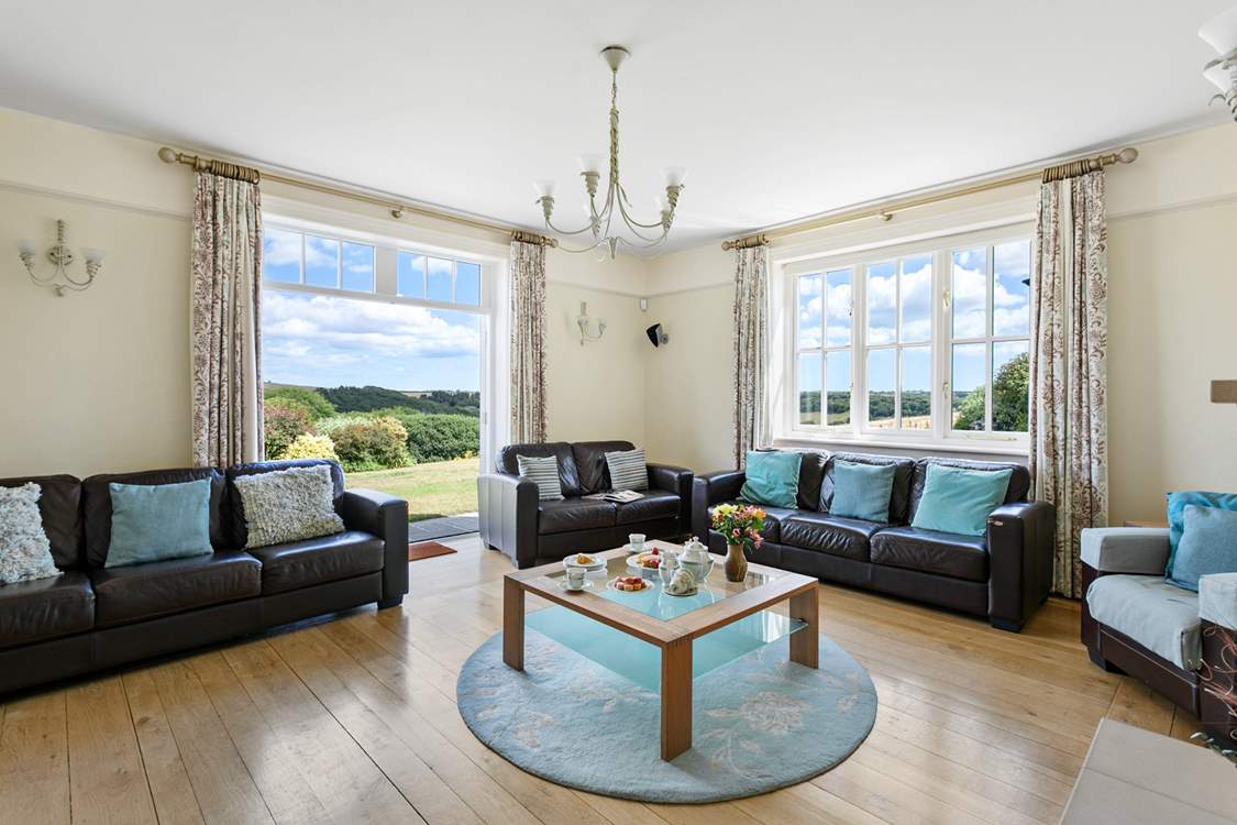 The first of two brilliant sitting-rooms.