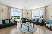The first of two brilliant sitting-rooms.