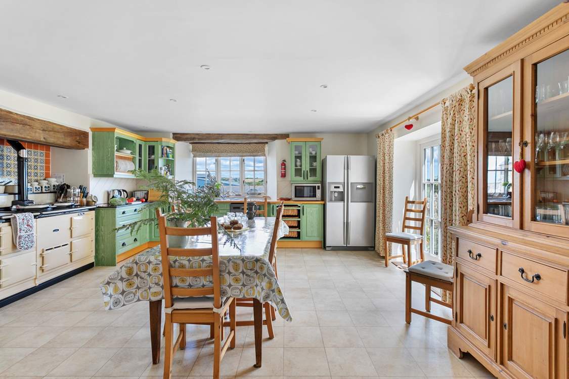 The spacious kitchen has a homely charm to it.