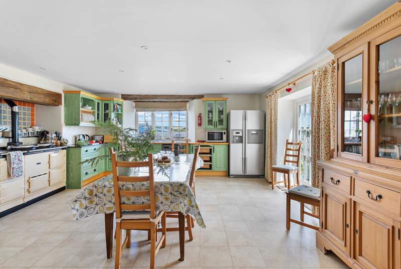 The spacious kitchen has a homely charm to it.
