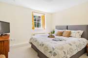 Bedroom one can be found downstairs and houses a fantastic 'zip and link' bed – super-king or twin beds as guests wish.