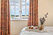 Enjoy a spot of breakfast in bed on your holiday.