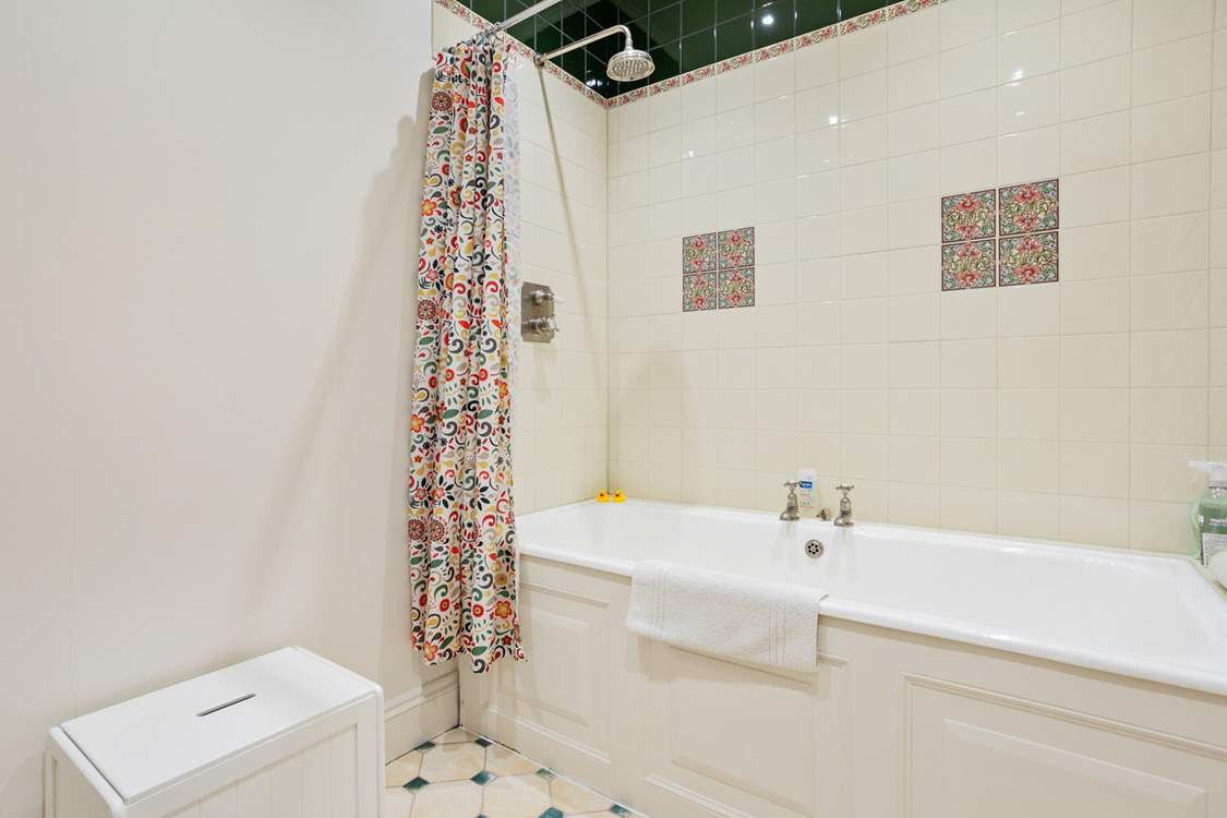 Bedroom three also comes equipped with an en suite bathroom.