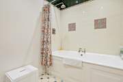 Bedroom three also comes equipped with an en suite bathroom.
