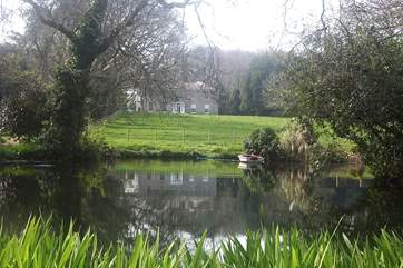 A view of the house from across the lake.