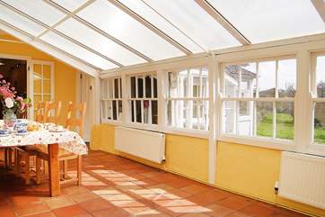There are lovely views out over the grounds from the conservatory/dining-room.