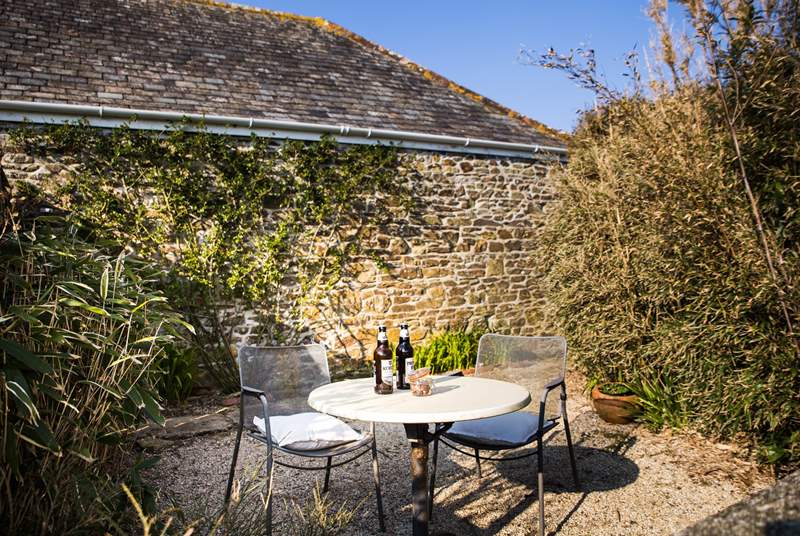 A sunny and shady spot depending on the time of day with views over the surrounding countryside.