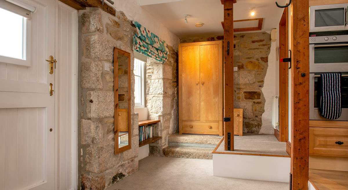 The bathroom is up the two steps in this quirky property.