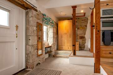 The bathroom is up the two steps in this quirky property.