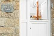Let the fresh oceanic air in through this characterful door.