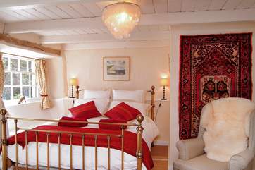 The sumptuous bedroom.
